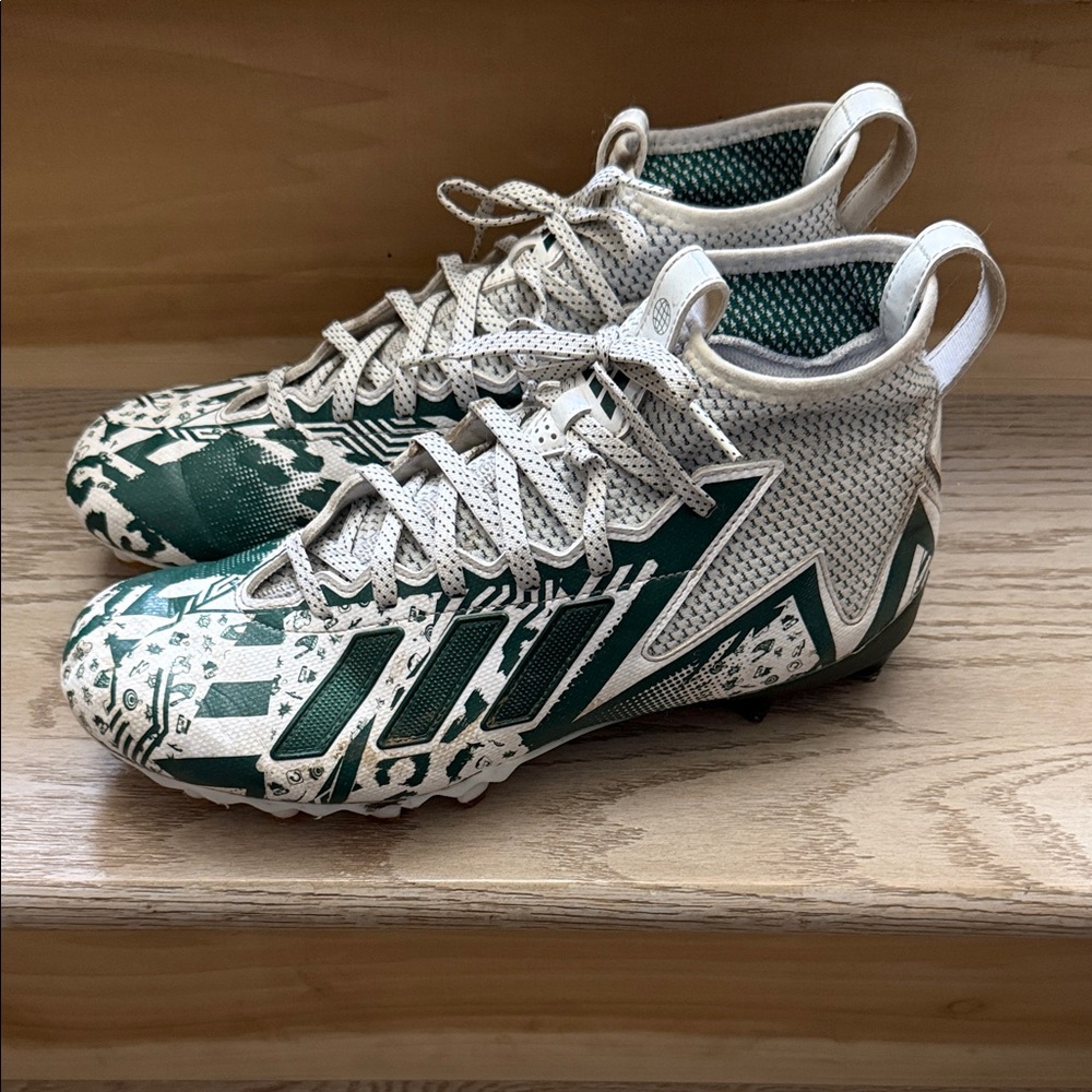 White and Green Athletic Cleats, size 10.5